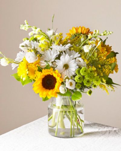 <p>Give a dose of sunshine in bloom. This stunning bouquet is teeming with rays of sunflowers, textured snapdragons and darling daisy poms to deliver the perfect pick-me-up for an occasion or as a treat to yourself.</p>