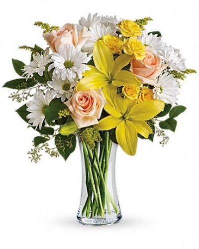 <div class="m-pdp-tabs-description">
<div id="mark-1" class="m-pdp-tabs-marketing-description">

The song says, "The sun'll come out tomorrow," but why not today? Whatever the weather, this sunny bouquet of yellow, peach and white flowers will brighten any day instantly. Perfect for a birthday, thank you or just because.

</div>
</div>
This sunny bouquet includes peach roses, yellow spray roses, yellow asiatic lilies, white daisy spray chrysanthemums and solidago accented with assorted greenery. Delivered in a glass gathering vase.