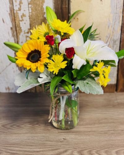 This charming arrangement features flowers arranged in an adorable mason jar. Don't be fooled by its name- your recipient is guaranteed to smile as they enjoy this selection. Sometimes, the best way to warm someone's heart is with the simple things.