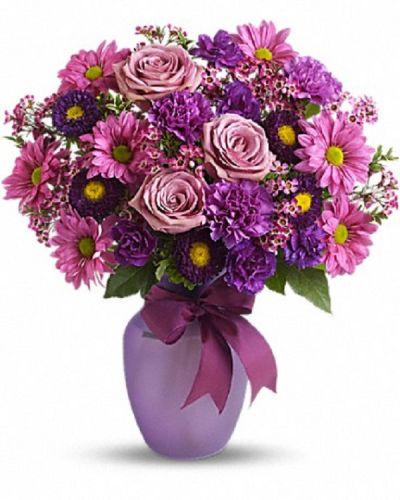 <div class="m-pdp-tabs-description">
<div id="mark-1" class="m-pdp-tabs-marketing-description">Know someone you love to make laugh? Someone you love to laugh with? Someone who could use a laugh? Someone who fits all of the above? Well, this beautiful arrangement has charms that extend way beyond its blossoms.</div>
</div>
<p id="arrngDescp">Lavender roses and daisy spray chrysanthemums, purple carnations, miniature carnations, matsumoto asters and pink waxflower are delivered in a sweet lilac vase that's tied with a purple satin ribbon. Love, laugh and send it today!</p>