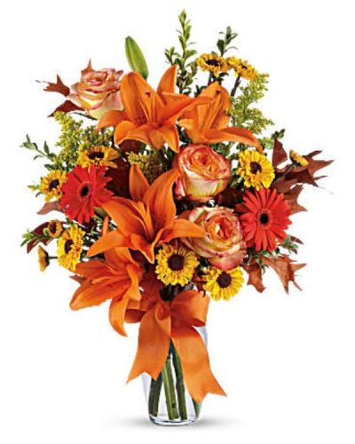 Feel the crisp beauty of fall with this wonderful bouquet.
This luscious arrangement is filled with a gorgeous assortment of autumnal hues, sure to delight your recipient with this dazzling array of rich colors and textures.