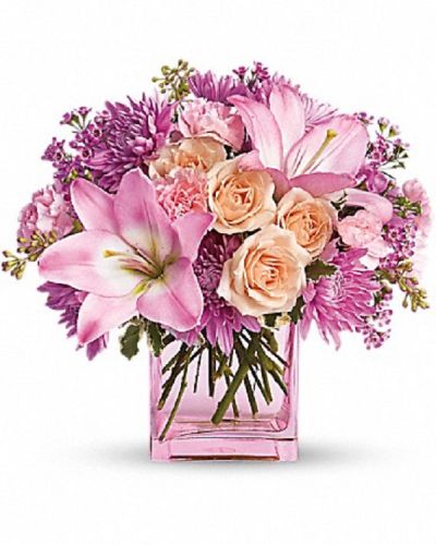<div class="m-pdp-tabs-description">
<div id="mark-1" class="m-pdp-tabs-marketing-description">Impossibly pretty. This decidedly beautiful arrangement is absolutely delightful.</div>
</div>
<p id="arrngDescp">Perfectly peachy peach roses, pink asiatic lilies and miniature carnations, lavender cushion spray chrysanthemums and waxflower, pittosporum and seeded eucalyptus fill an glass cube. Have one delivered and almost anything's possible.</p>