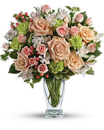 <div class="m-pdp-tabs-description">
<div id="mark-1" class="m-pdp-tabs-marketing-description">You'd do anything for them, so let them know how you feel by sending this generous and gorgeous arrangement. Who could ask for anything more?</div>
</div>
<p id="arrngDescp">Beautiful peach roses and spray roses, white alstroemeria, brilliant green carnations, peach hypericum and fresh garden greens are perfectly hand-arranged in a feminine Couture Vase.</p>