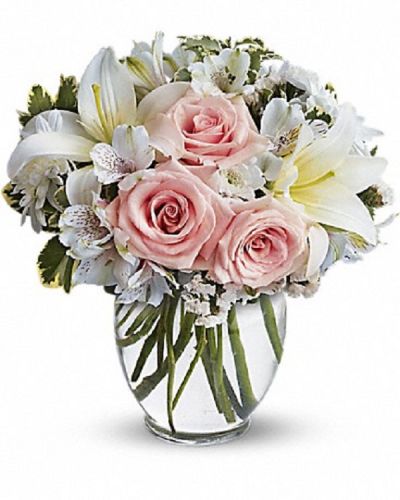 <div class="m-pdp-tabs-description">
<div id="mark-1" class="m-pdp-tabs-marketing-description">
<p>This beautiful bouquet will most certainly arrive in style! Ready for the runway, as it were. A delightful combination of light colors and lovely flowers, it's simply beautiful.
</p></div>
</div>
<p>Light pink roses, white asiatic lilies, alstroemeria, cushion spray chrysanthemums and statice are delivered in a stylish vase. Style to spare!</p>