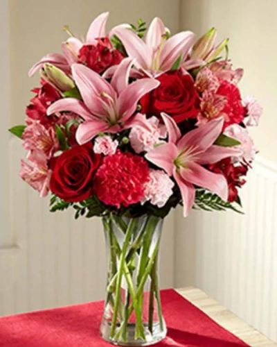 <p>Bring the love and beauty of flowers straight to your special recipient's door. The Forever and a Day Bouquet brings together an impressive array of blushing pink and red blooms creating an unforgettable rush of romance.</p>