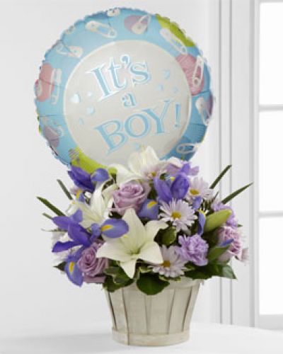 <p>The FTD® Boys Are Best!™ Bouquet is blooming with sweet love to congratulate the new family on their darling baby boy! Lavender roses, blue iris, lavender carnations, lavender daisies, white Asiatic lilies and lush greens are beautifully arranged in a round whitewash woodchip basket. Presented with a Mylar balloon declaring, “It’s a Boy!” this incredible flower arrangement is the perfect welcome for their new addition.</p>