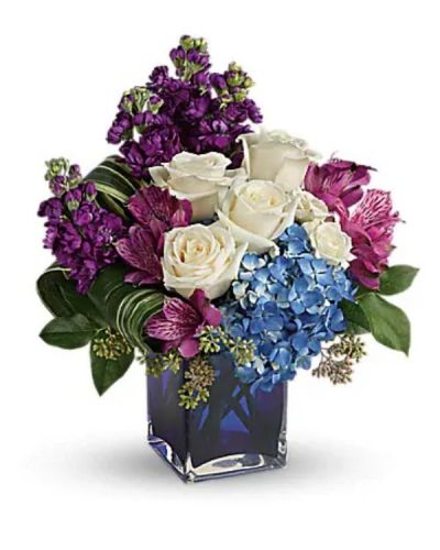 <div class="m-pdp-tabs-description">
<div id="mark-1" class="m-pdp-tabs-marketing-description">Reminiscent of a beautiful impressionist portrait, the deep purples, fresh blues and crisp whites of this stunning bouquet make an unforgettable artistic statement. What a lovely surprise on any occasion!</div>
</div>
<p id="arrngDescp">Blue hydrangea, crème roses, white spray roses, purple alstroemeria and purple stock are arranged with lemon leaf and variegated aspidistra leaves.</p>