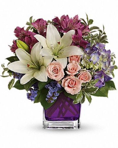 <div class="m-pdp-tabs-description">
<div id="mark-1" class="m-pdp-tabs-marketing-description">Hello, gorgeous! This lovely bouquet includes purple hydrangea, light pink spray roses and white asiatic lilies arranged in our vibrant violet glass cube.</div>
</div>
<p id="arrngDescp">Purple hydrangea, light pink spray roses, white asiatic lilies, dark pink alstroemeria and lavender sinuata statice are accented with assorted greens.</p>