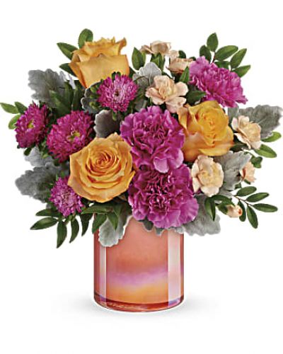 <div id="mark-3" class="m-pdp-tabs-marketing-description">
<div id="mark-3" class="m-pdp-tabs-marketing-description">
<div id="mark-3" class="m-pdp-tabs-marketing-description">Like a spectacular spring sunset, this radiant bouquet of oranges and pink blooms, presented in a peach glass vase with shimmering pearlized finish is sure to brighten anyone's day!</div>
<p>This bouquet features peach roses, dark pink carnations, peach miniature carnations, hot pink matsumoto asters, dusty miller, and huckleberry.
</p></div>
</div>